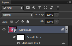 The Photoshop Layers panel showing StarSpikes Pro 4 as a Smart Filter